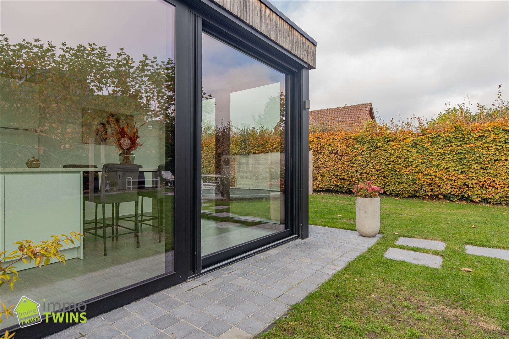 Gezellige open bebouwing met garage, tuin en oprit te Grembergen foto 8