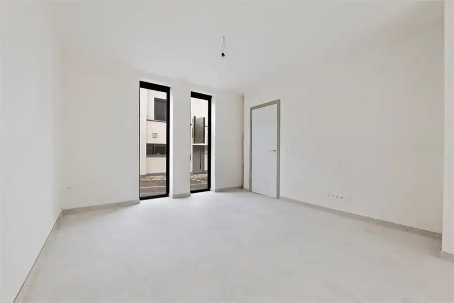 KNAPPE NIEUWBOUWWONING IN HET CENTRUM VAN BORGLOON (MOGELIJKHEID AANKOOP 6% BTW) foto 16