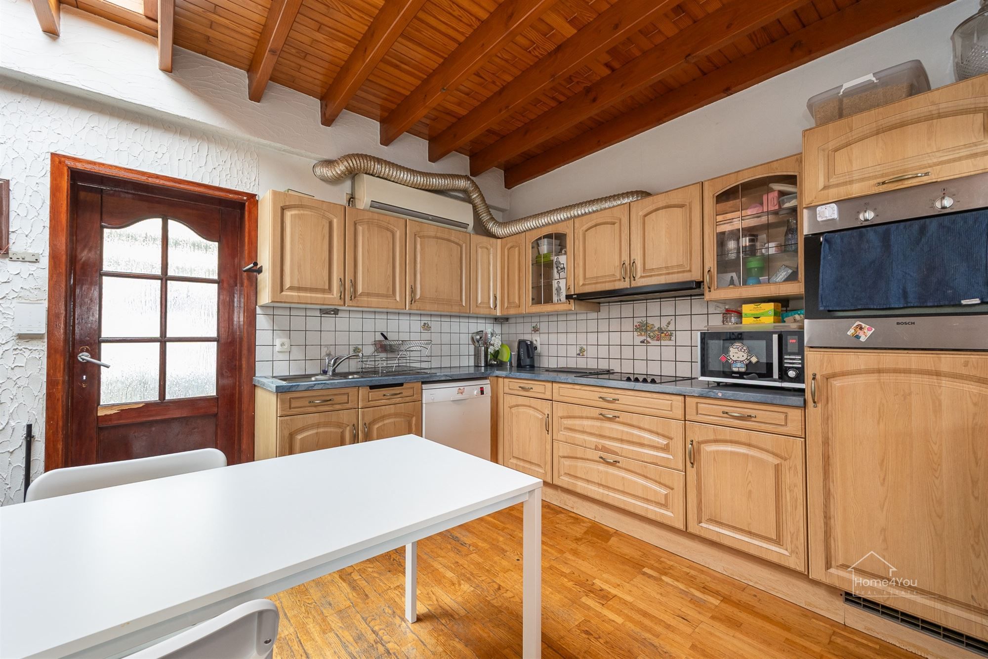 Ontdek deze charmante rijwoning in het hart van Merksem! foto 3