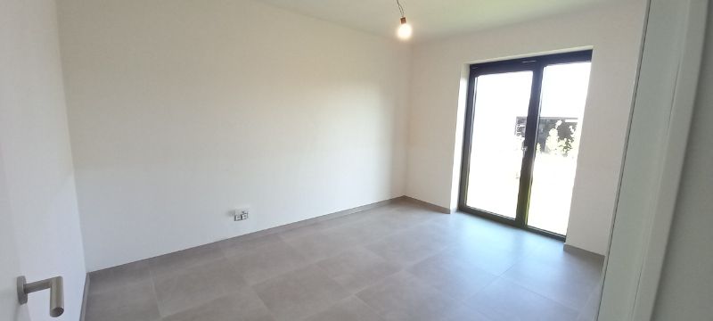 Dit appartement is gelegen langsheen de Langerbrugsestraat te Evergem. foto 11