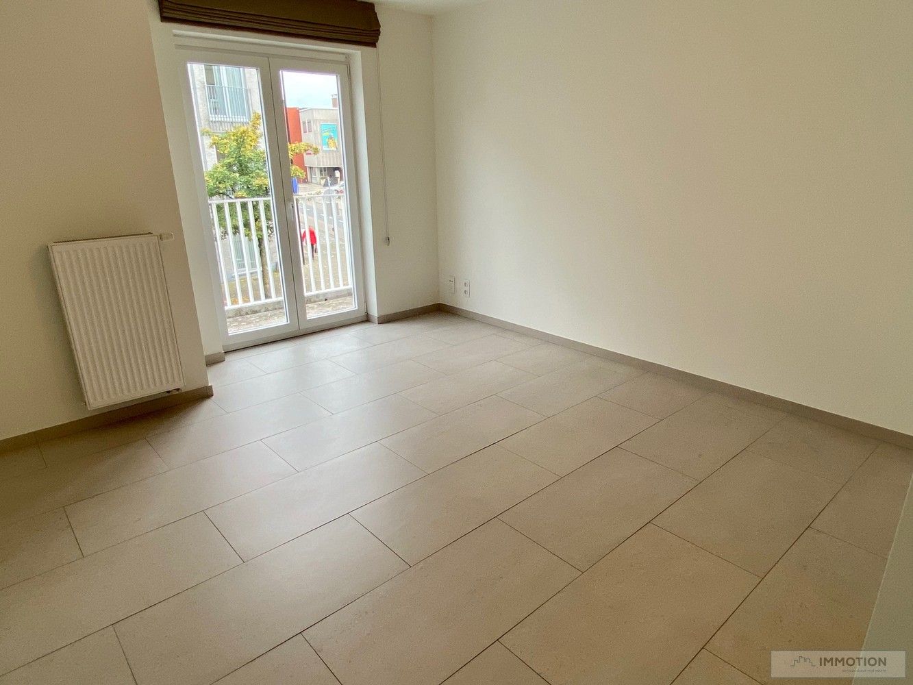 Groot appartement in centrum Kuurne met zuidelijk terras en parkeerplaats foto 9