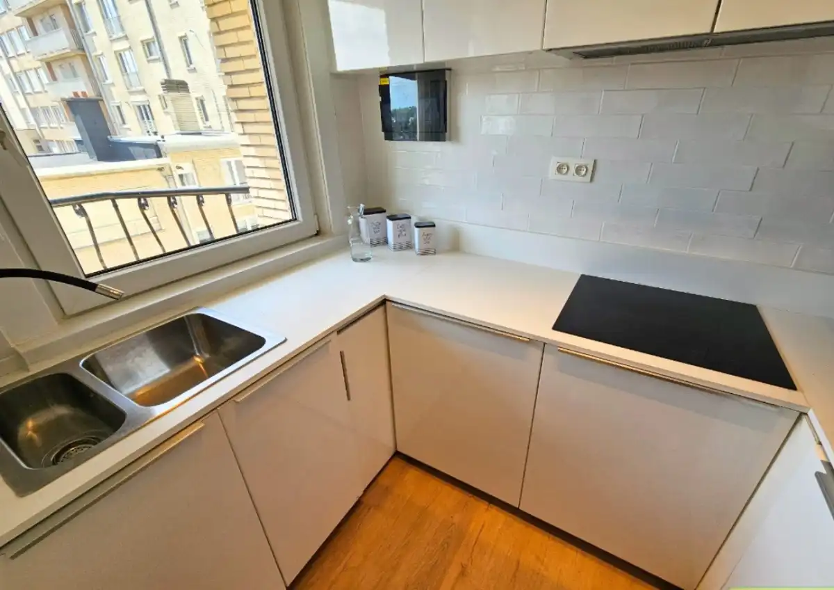 GERENOVEERD APPARTEMENT MET ZIJDELINGS ZEEZICHT TE KOOP IN DE PANNE foto 8