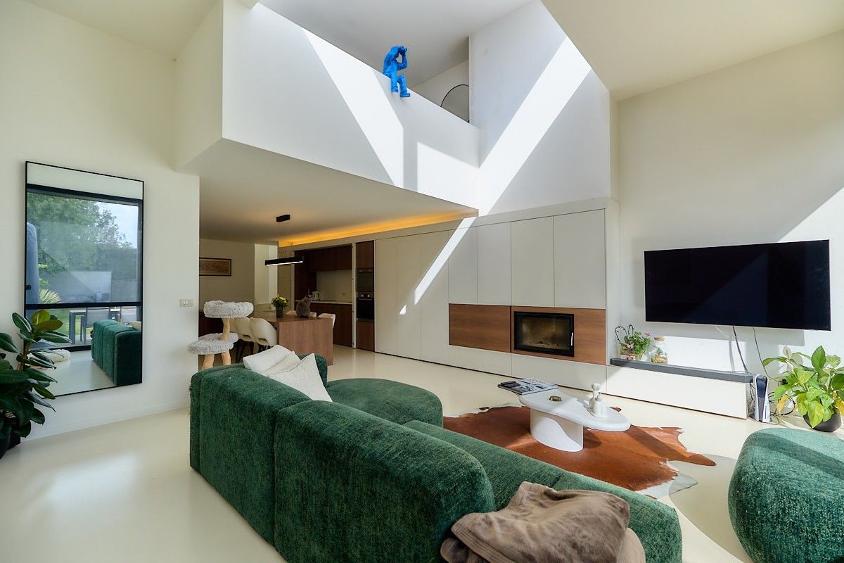 Exclusieve A-label Architectenwoning met polyvalente ruimte foto {{pictureIndex}}