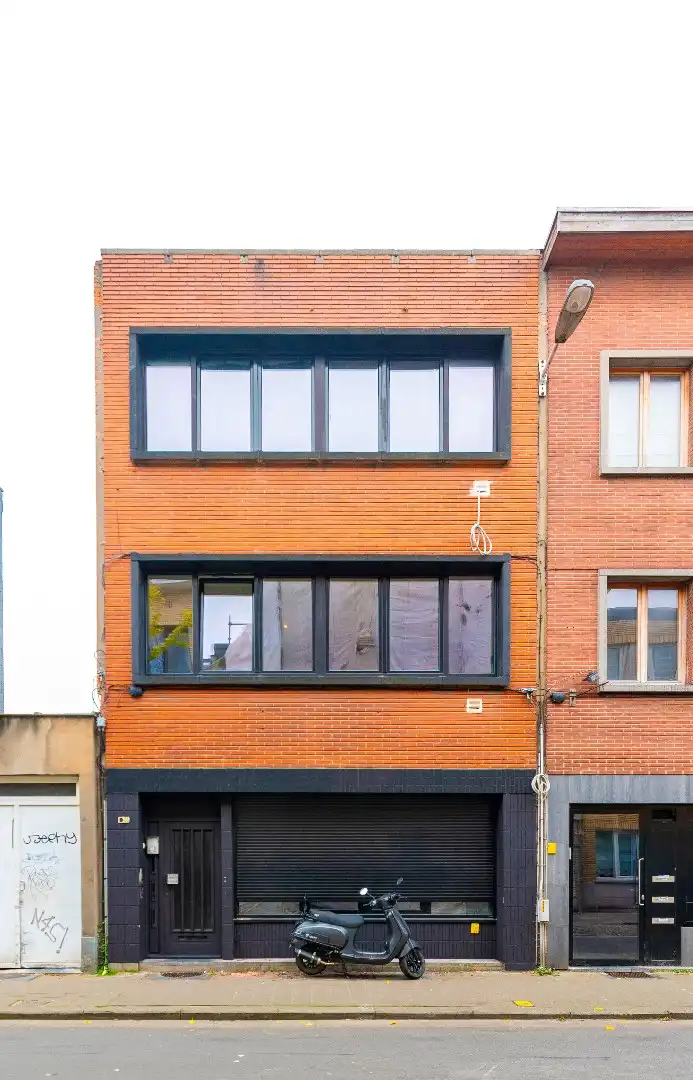 Opbrengsteigendom (3 units) met tuin en terras foto {{pictureIndex}}