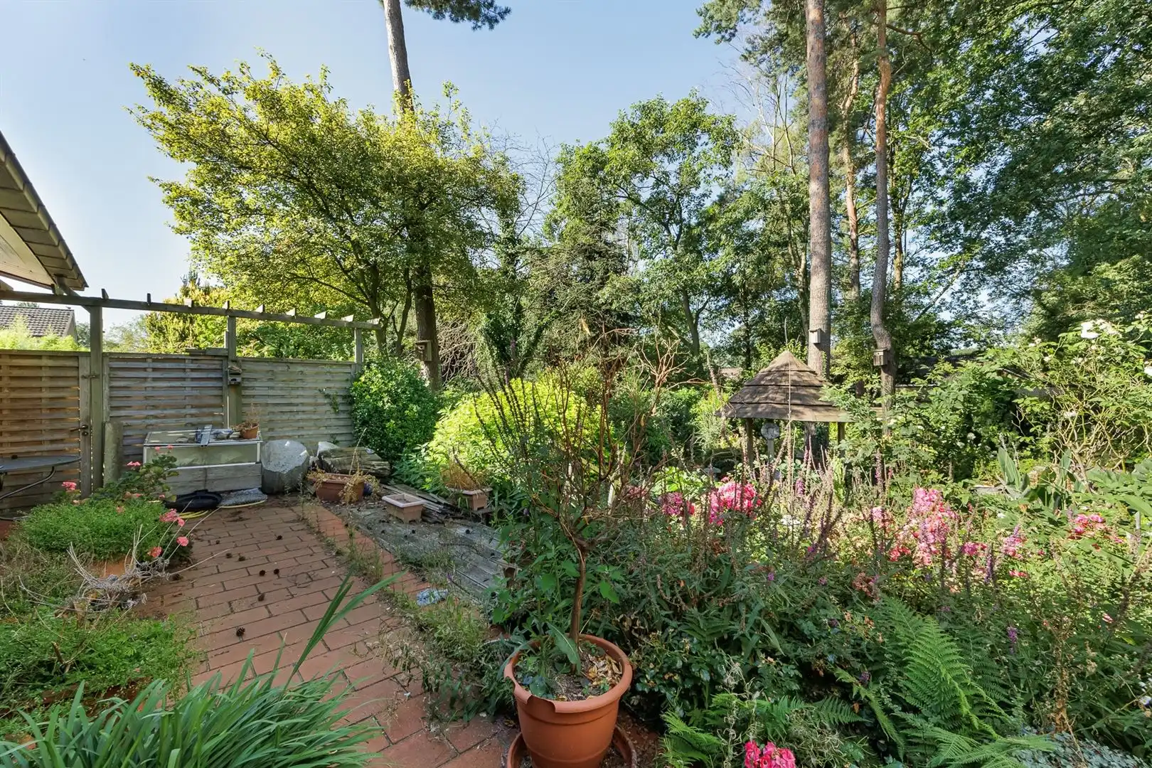 Vrijstaande woning met zuidwestgerichte tuin in groene woonwijk foto 20
