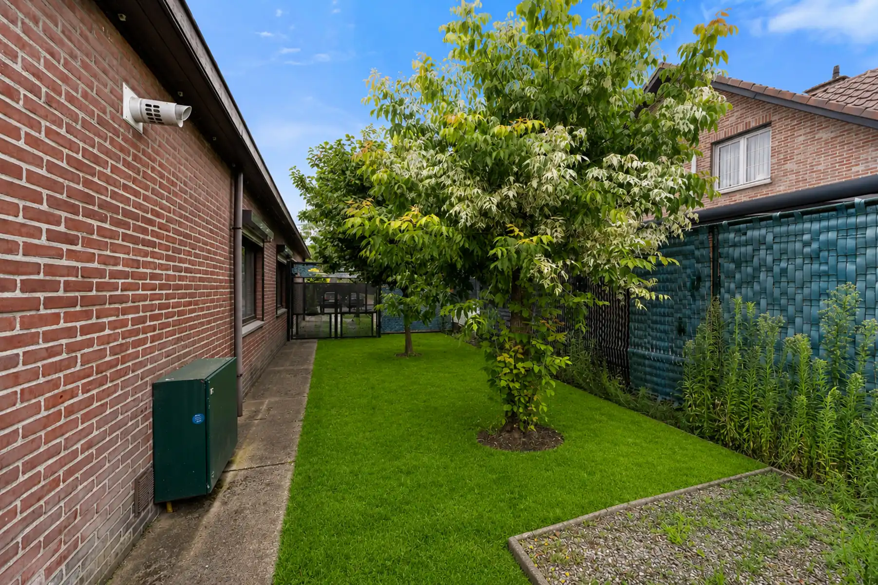 Charmante gelijkvloerse woning met 3 slaapkamers, garage en zonnige tuin. foto 4