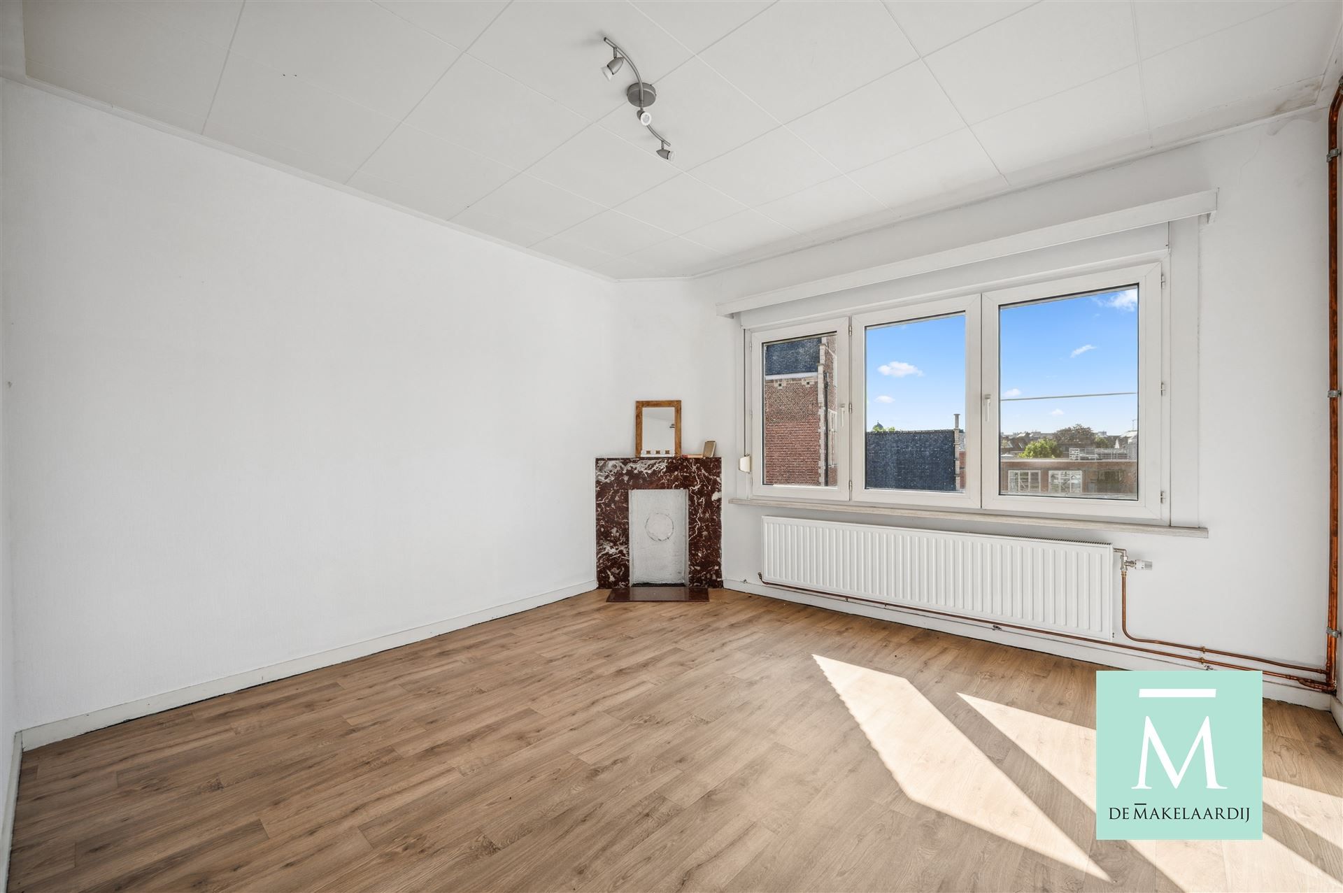 Appartementsgebouw met handelspand op het gelijkvloers foto 10