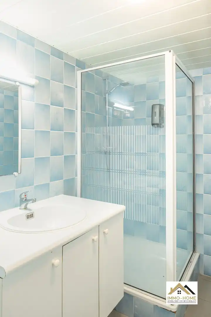 Zeer ruim gelijkvloers appartement met woonkelder en private tuin  foto 22