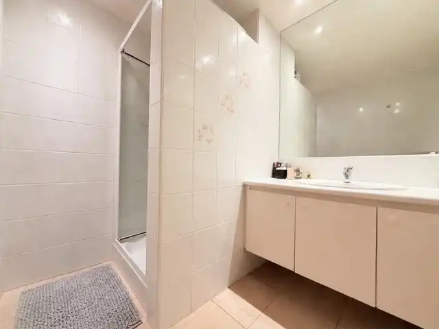Gelijkvloers appartement met tuin en uitweg foto 4