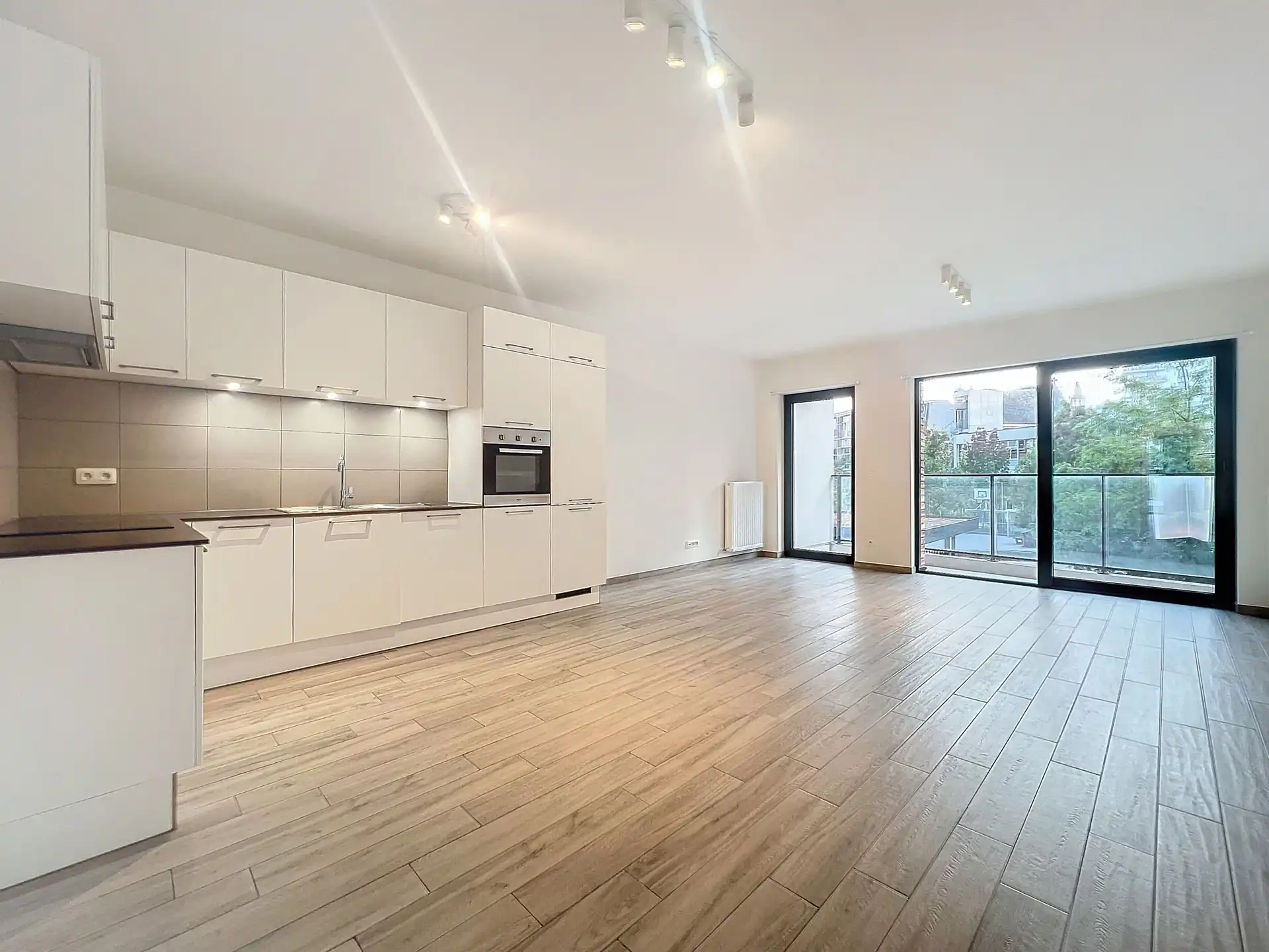 Appartement met 2 slaapkamers + terras van ±12 m² foto {{pictureIndex}}