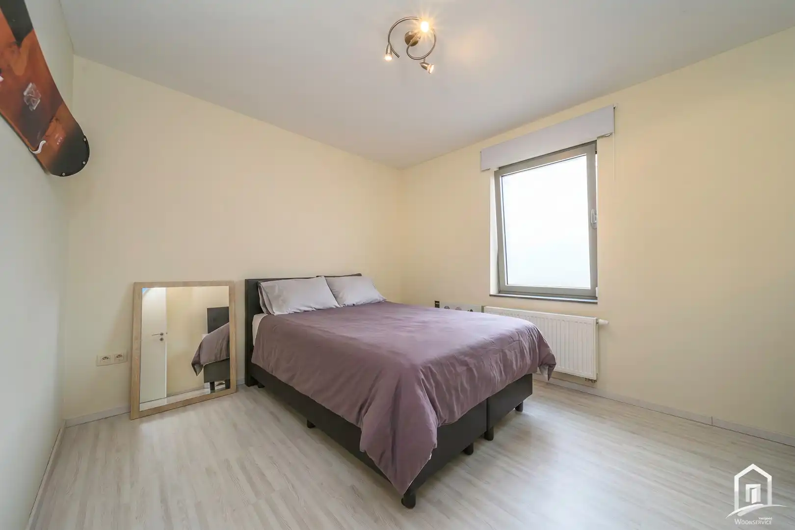 Ruim gelijkvloers appartement met 2 slaapkamers en tuin ! foto 10
