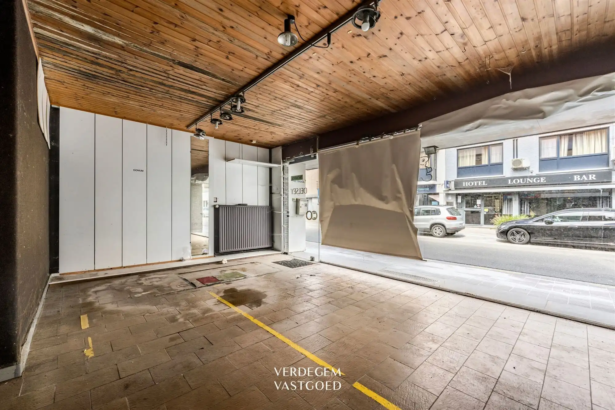 Renovatieproject: centraal gelegen handelspand met woonst en tuin foto 7
