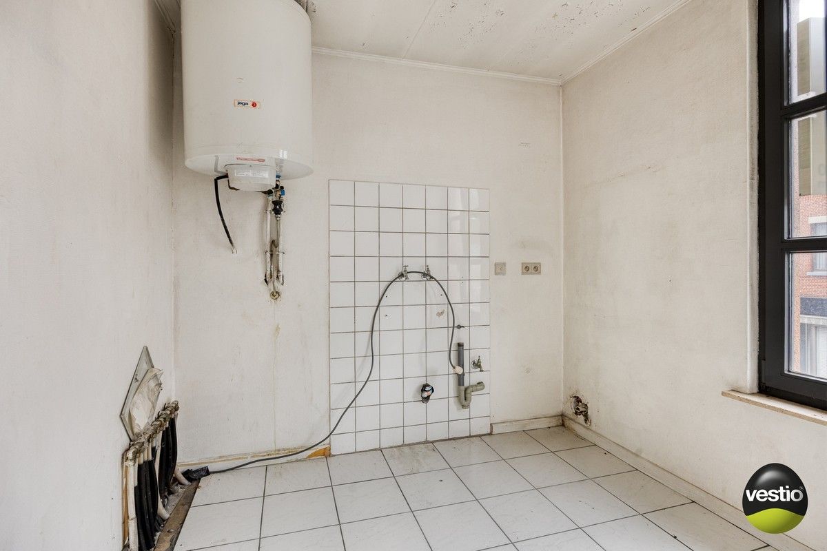 Handelspand met woonst / projectopportuniteit aan de Luikersteenweg. foto 14