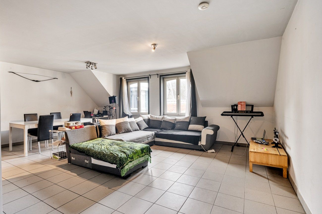 Opbrengsteigendom: commercieel pand en 2 appartementen : CENTRUM foto 10