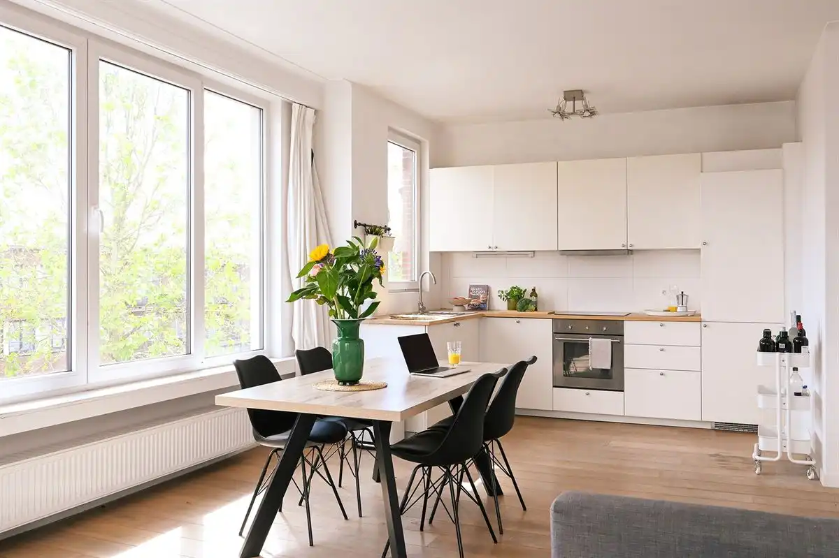Supergezellig lichtrijk hoekappartement met 2 slpk foto 6