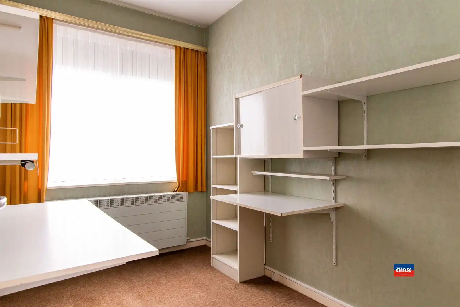 Halfopen bebouwing met 3 slaapkamers, tuin + 3 garageboxen foto 19