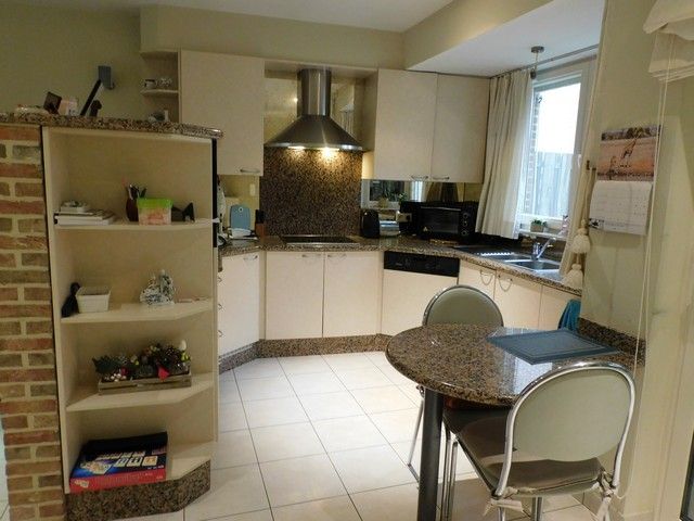 Prachtig gelijkvloers appartement in het centrum met garage  foto 6