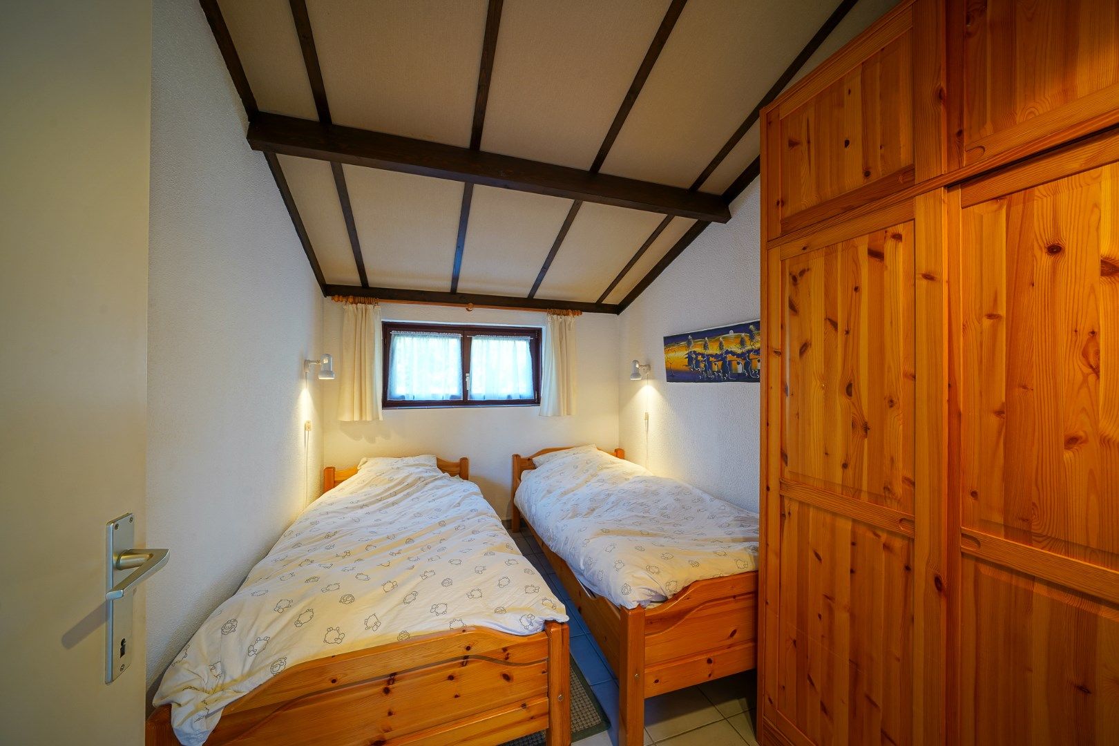 Instapklare vakantiewoning met zonnige tuin en 2 slaapkamers foto 12