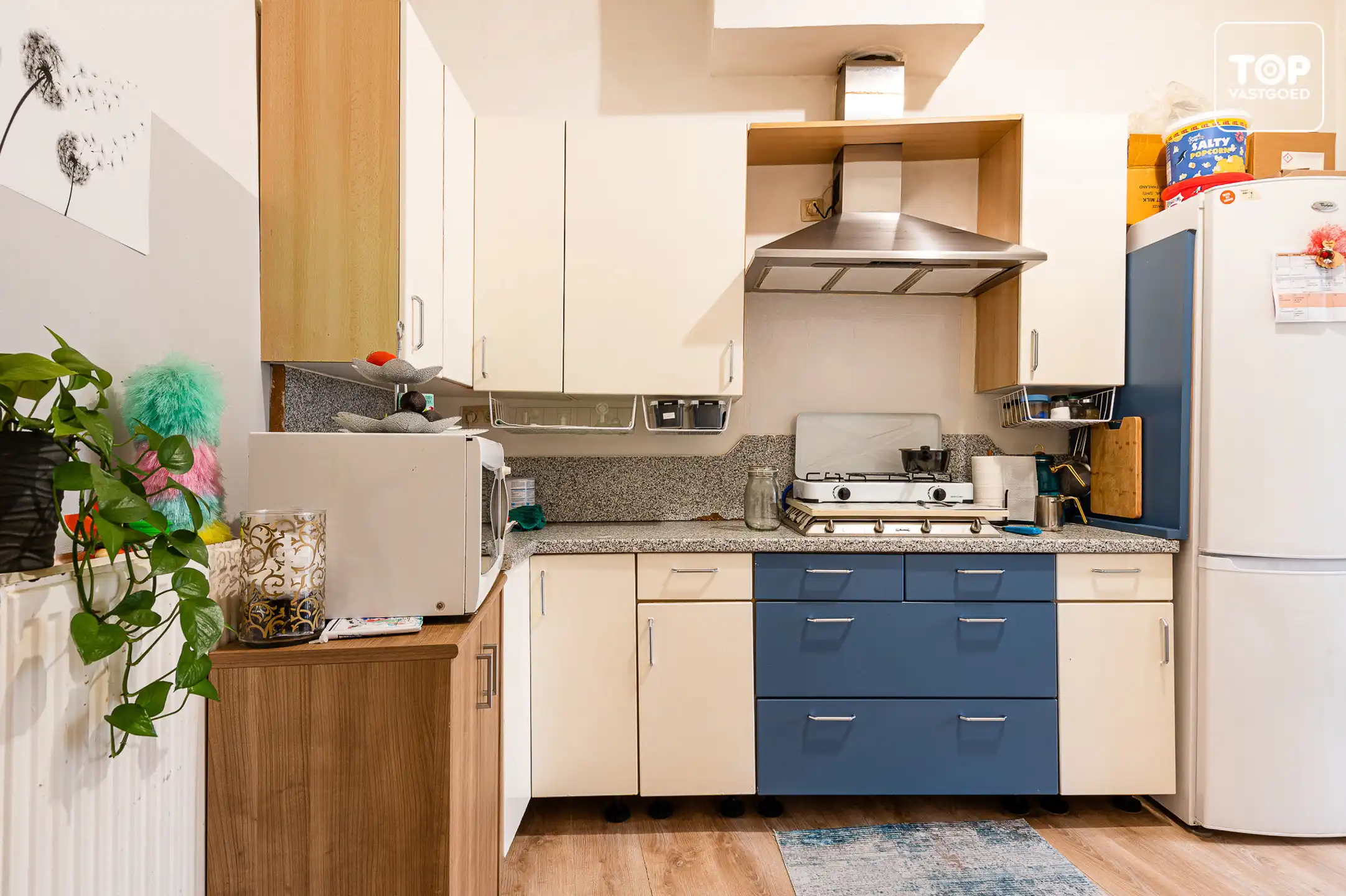 DISCREET Centraal gelegen (opbrengst) eigendom met verhuurd handelsgelijkvloers en 2-slaapkamer woonst foto 12