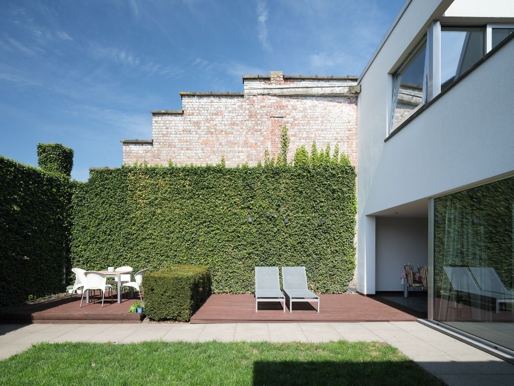 Bijzonder ruime & karaktervolle burgerwoning met zonnige stadstuin en extra bijwoonst in een hippe en opkomende buurt nabij Dok Noord. foto 12