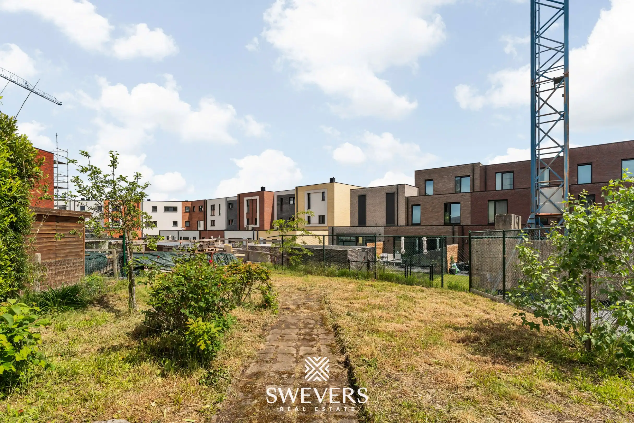 Statige woning met veel potentieel in het centrum van Diepenbeek foto 24