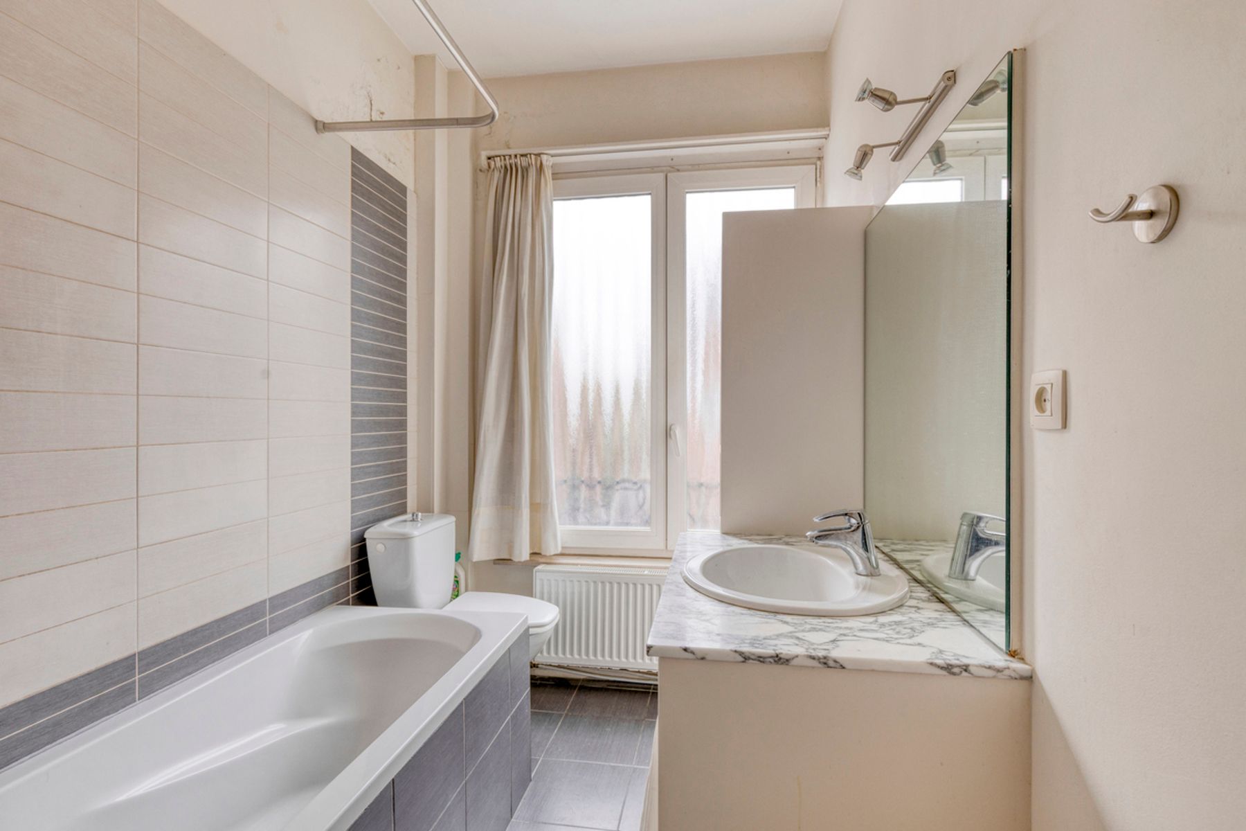 Mooie rijwoning met potentieel foto 12