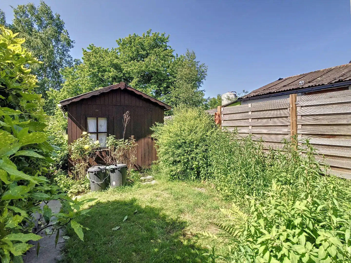 Centraal gelegen woning met twee ruime slaapkamers, zonnige tuin en droge kelder - EPC 252 kWh/m² - bewoonbare oppervlakte van 143 m² foto 19