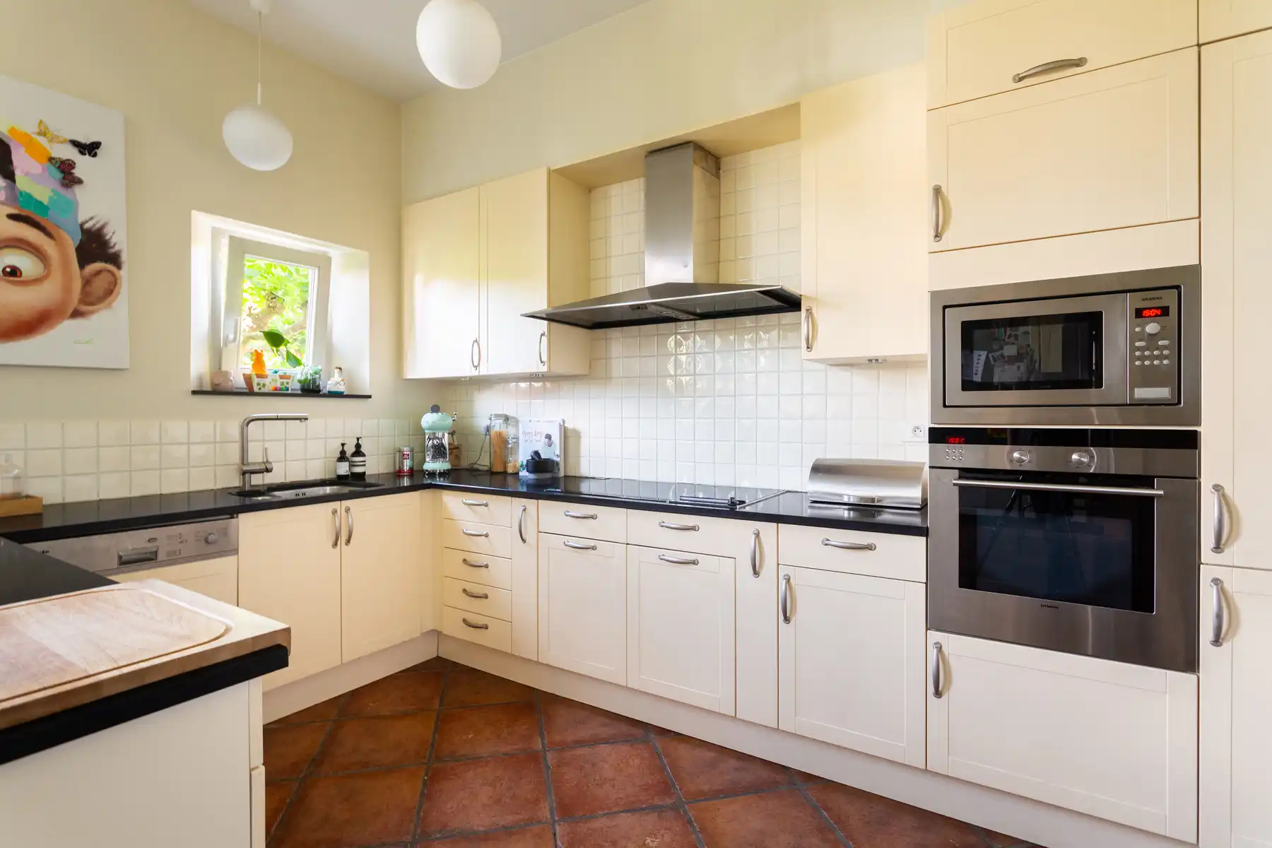 Kontich | Ruime en charmante woning met zuidgerichte tuin foto 13
