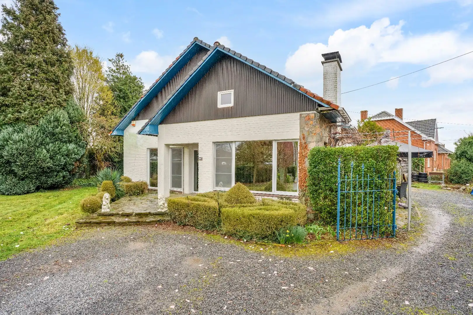 Op te knappen karakteristieke hoekwoning, 4 slpk, (EPC-label C) gelegen aan het Haspengouwse landschap. foto 3