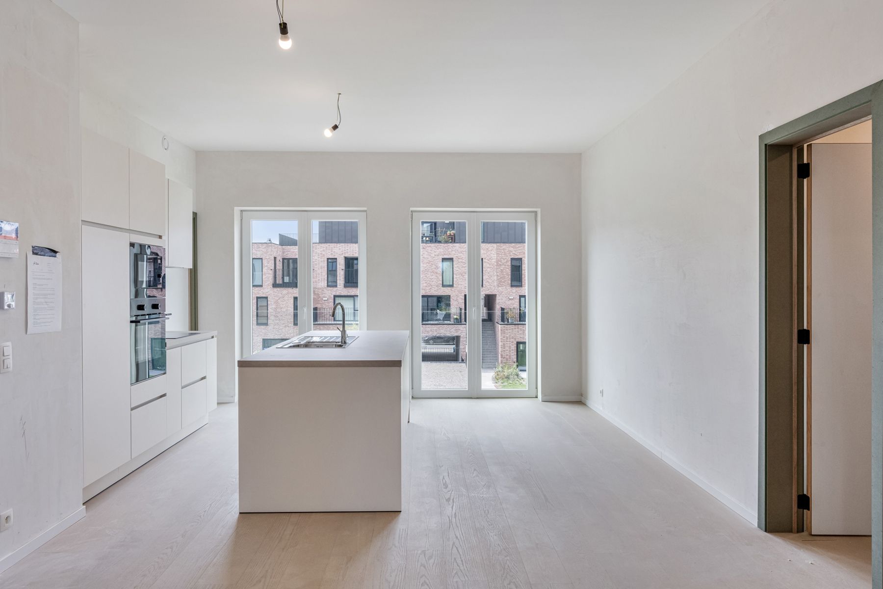 Nieuwbouwappartement met 2 slpks + 2 terrassen foto 2
