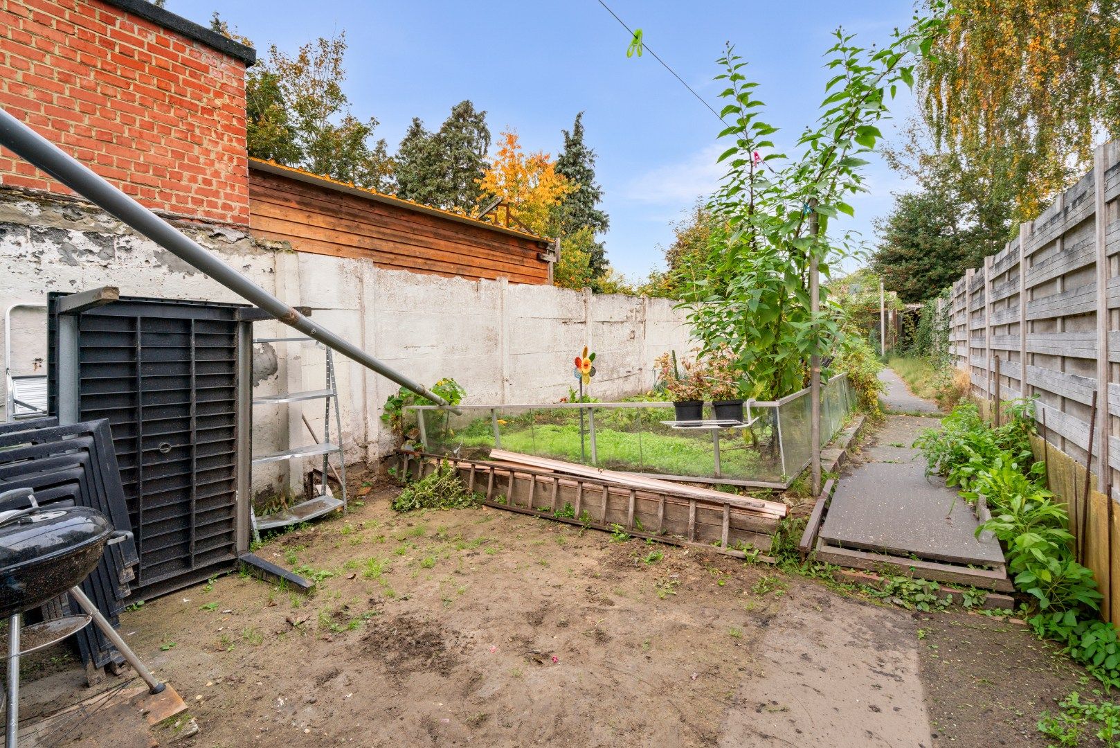 Instapklare stadswoning met ruime tuin foto 15