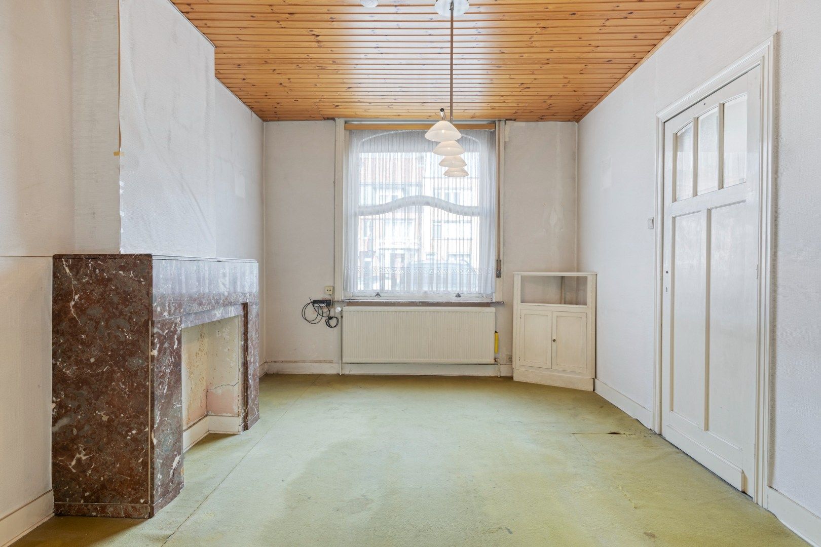 Te renoveren woning met 4 slaapkamers, garage en tuin in Kessel-Lo – EPC 906 kWh/m² - bewoonbare opp. 163 m² foto 3
