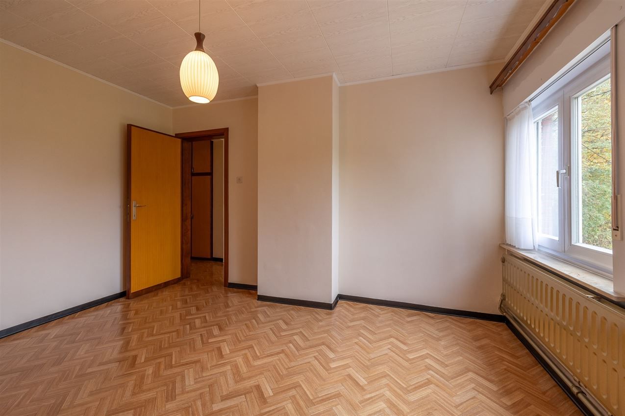 Temidden van agrarisch gebied, grenzend aan bos foto 25