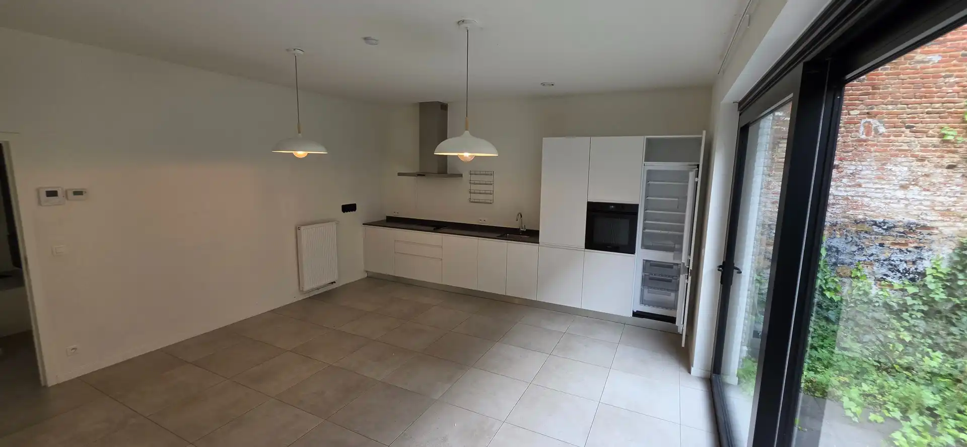 Ruime stadswoning met 3 slaapkamers, privétuin en ondergrondse staanplaats in Antwerpen foto 9