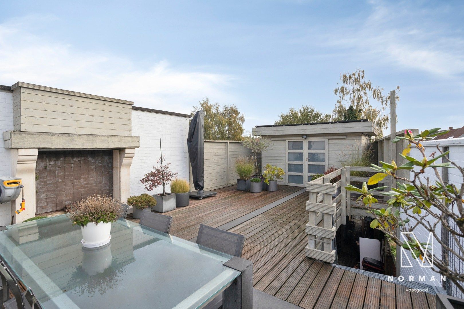 Duplex te koop in het centrum van Kuurne met 3 slaapkamers en een groot zongericht terras met tuinhuis.  foto 28