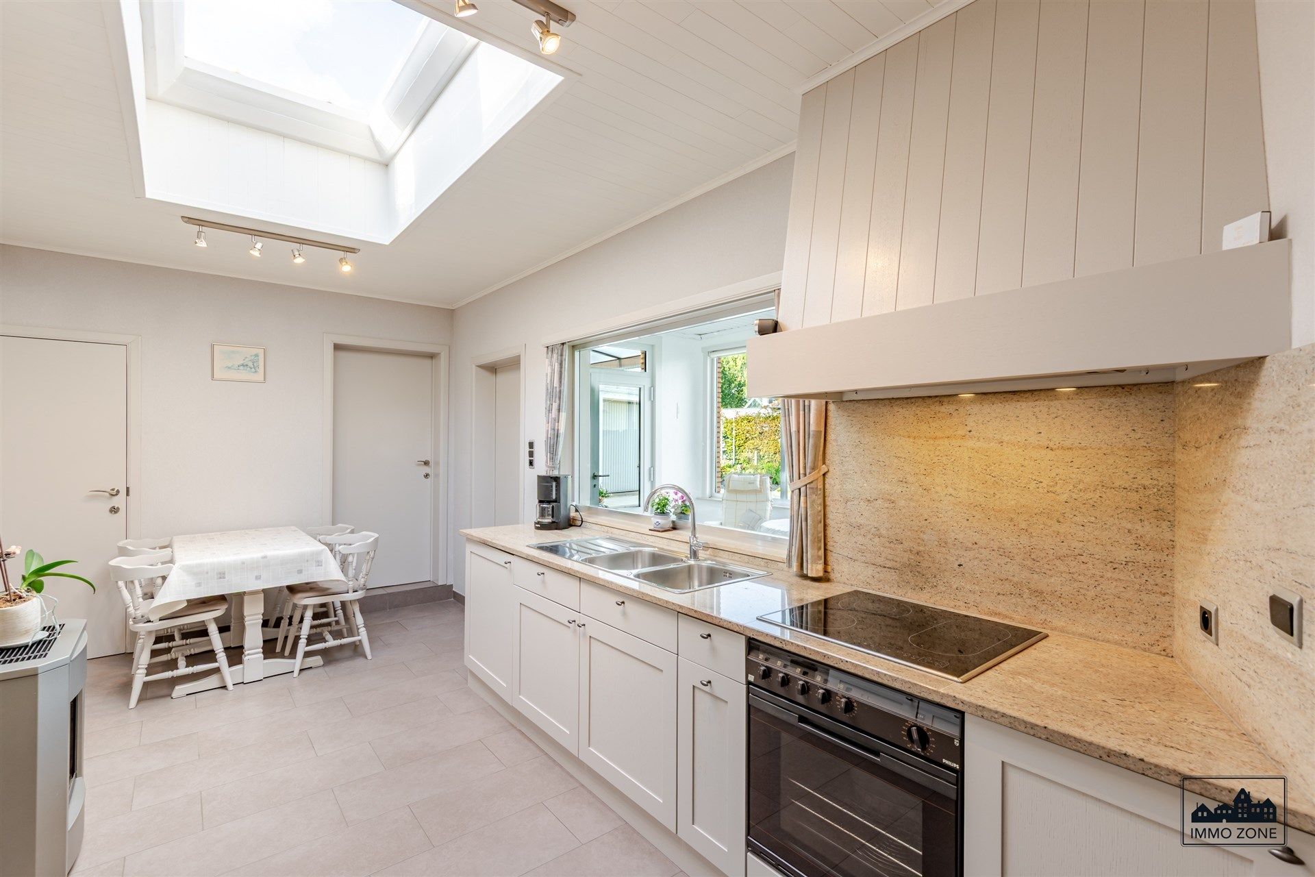 Ruime halfopen woning met uitbreidingspotentieel in Hamme! foto 6