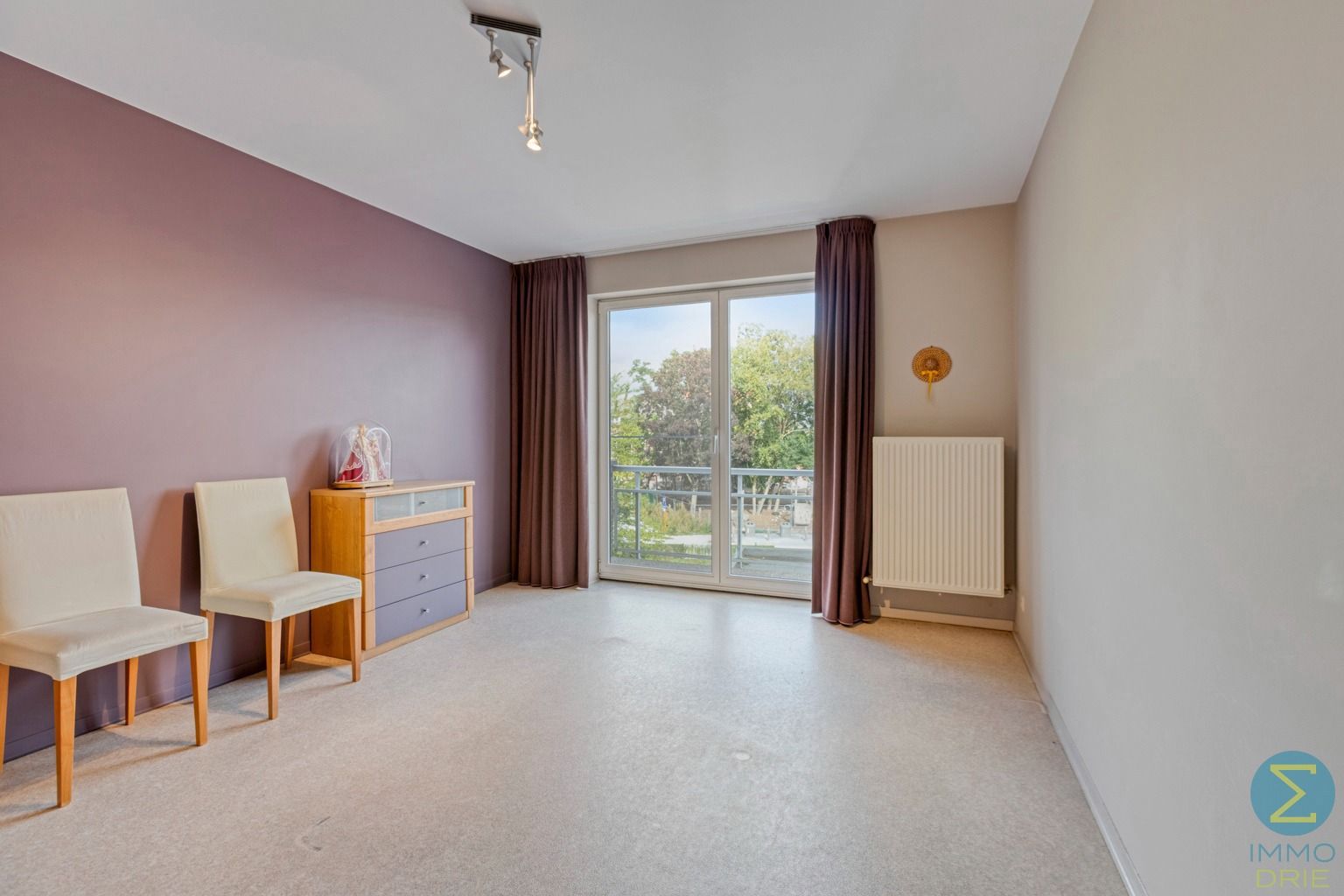 Ruim 2-slaapkamerappartement met balkon, garage én kelder  foto 11