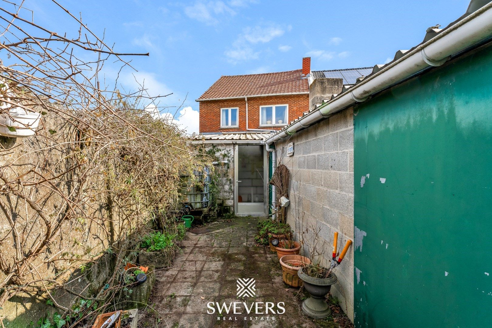 Ruime halfopen woning met renovatiepotentieel in Borgloon foto 30