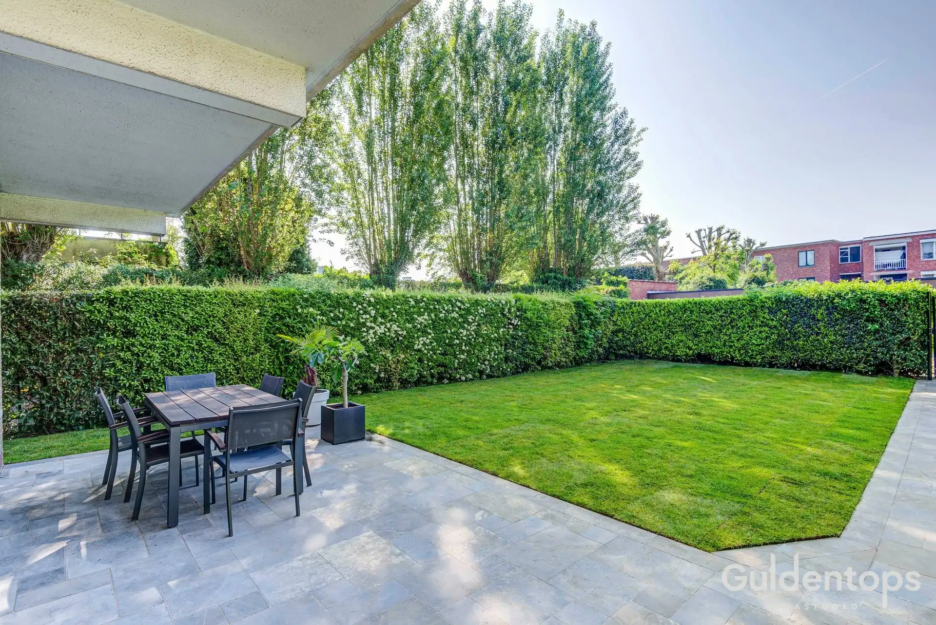 Modern ruim gelijkvloers (2 slk) appartement met ruime tuin foto 24