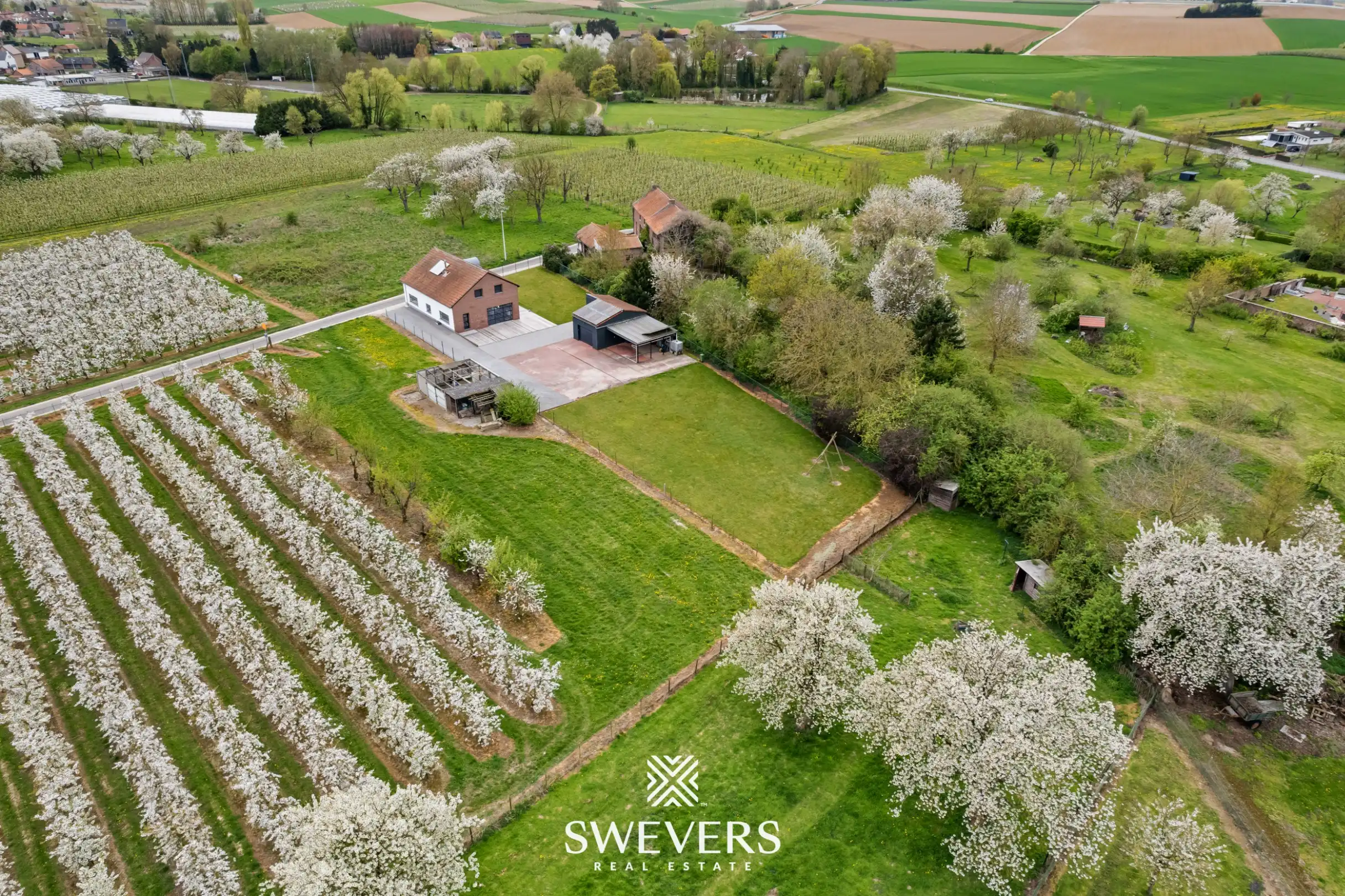 Instapklare open bebouwing met ruime tuin en prachtig uitzicht tussen de boomgaarden in Gingelom foto 37