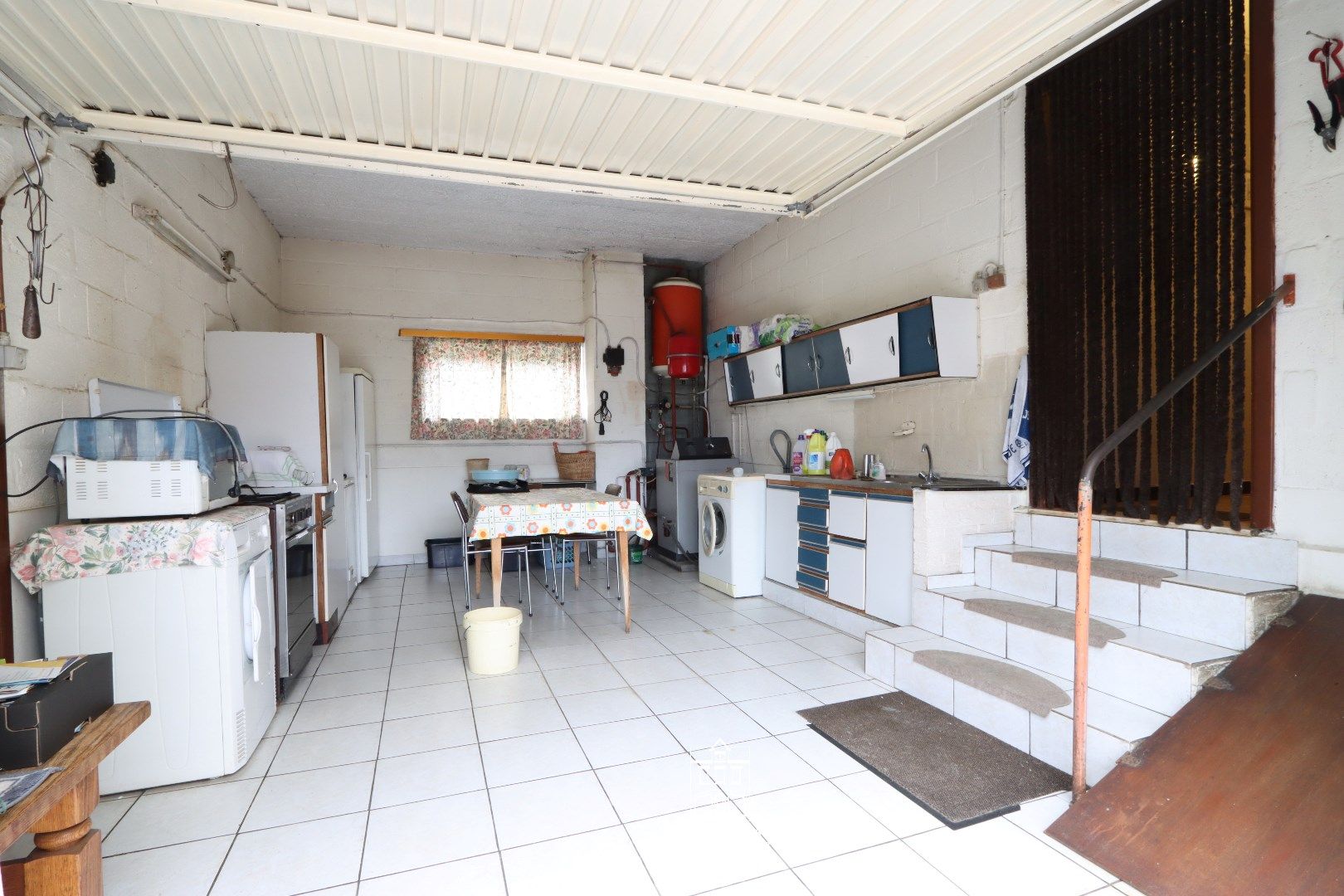 Verzorgde gelijkvloerse woning met tuin in verzorgde straat in centrum van Dilsen foto 16