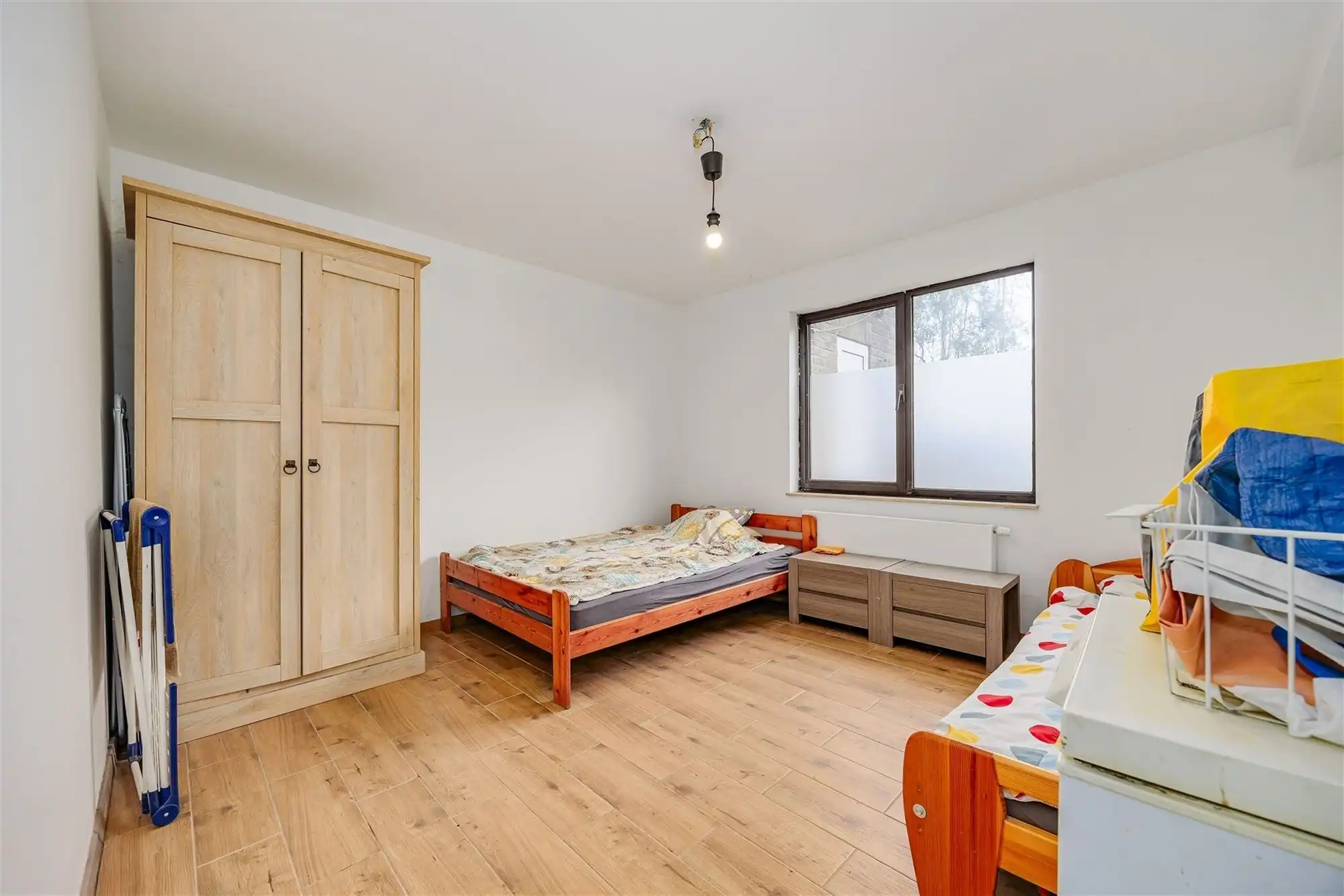 Instapklaar 2 slaapkamer appartement met gezellige tuin foto 9