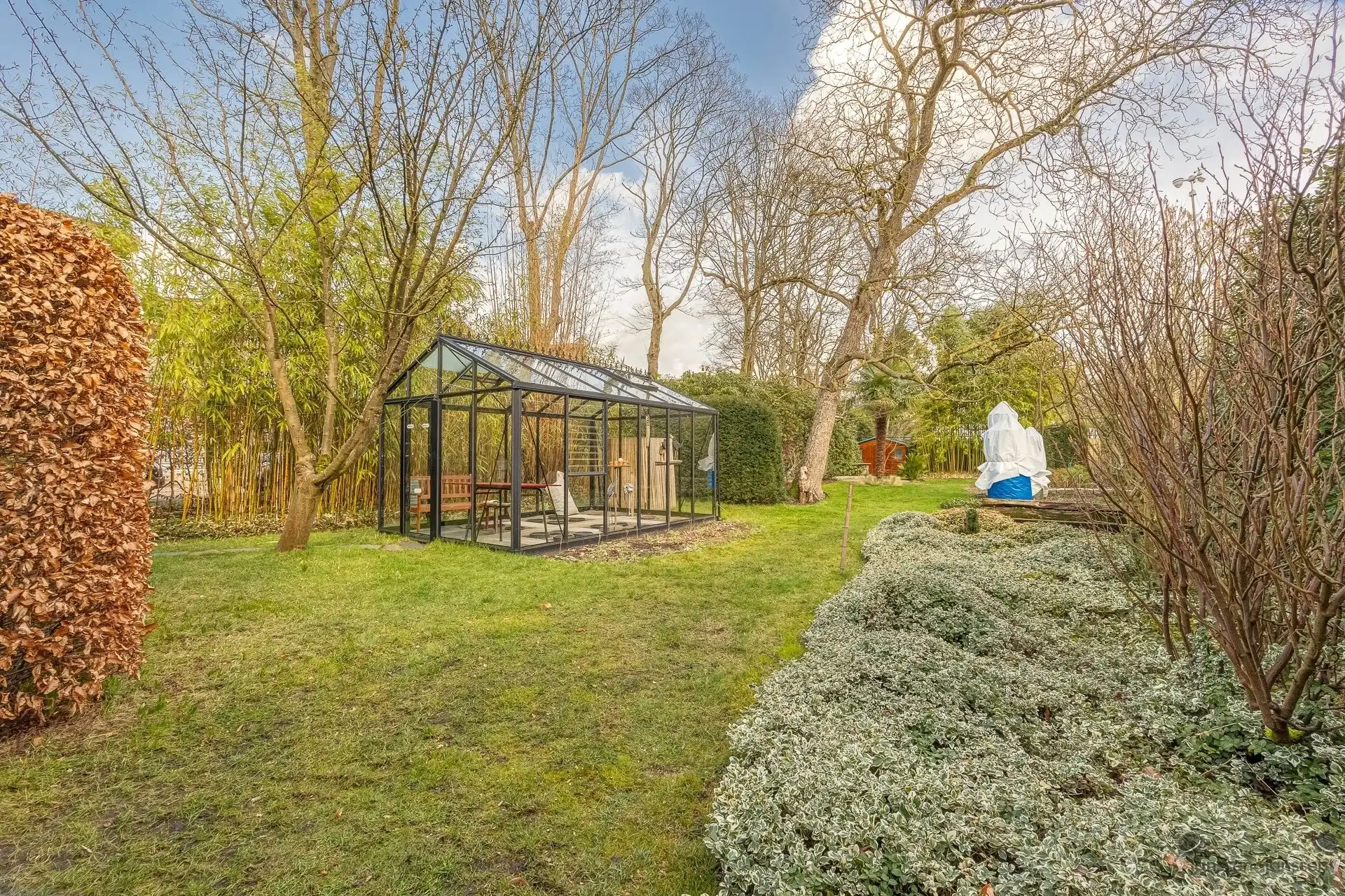 Unieke kans in het hart van Brasschaat karaktervolle villa met dubbele woningstructuur op prachtig perceel van 2.080 m² foto 7