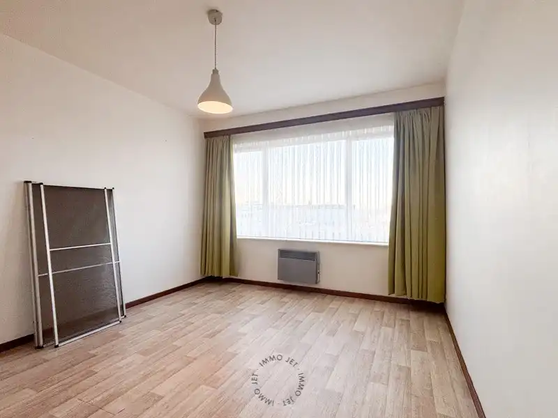 Ruim en lichtrijk appartement met 3 slaapkamers in hartje Beveren foto 10