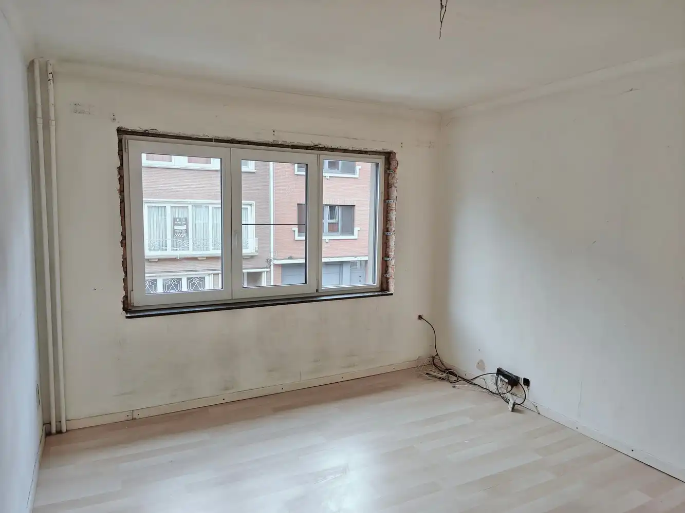 Te renoveren rijwoning met 4 slaapkamers en leuke stadstuin. foto 12