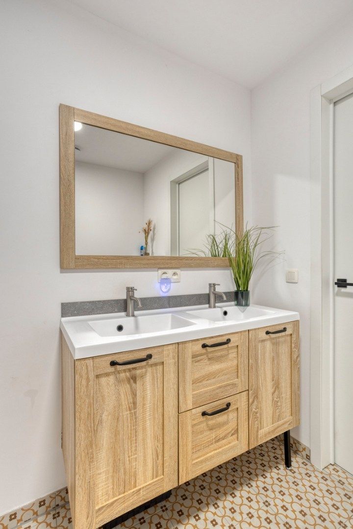 Gelijkvloers BEN-appartement met grote privétuin en parkeerplaats foto 16