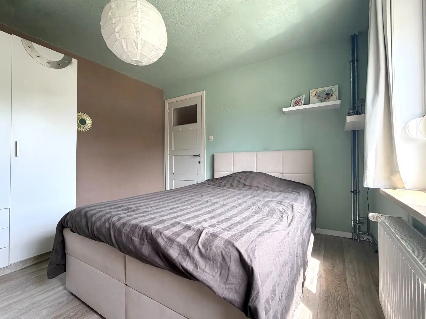 Instapklare rijwoning met garage te koop te Harelbeke! foto 12