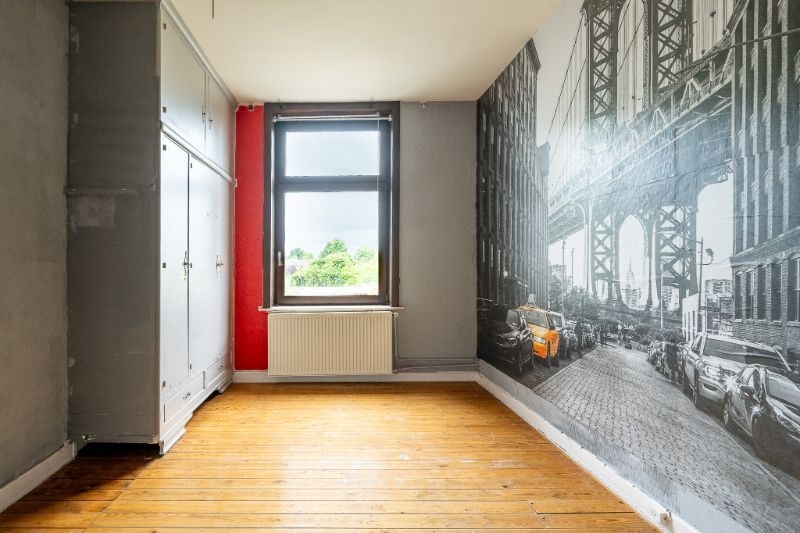 Ruime en veelzijdige rijwoning met garage achteraan en aparte ingang foto 14