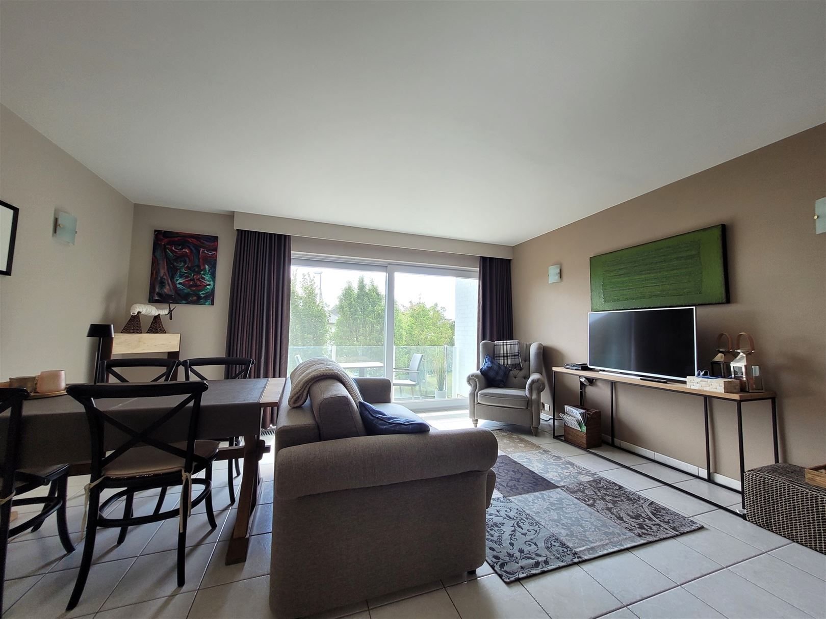 Lichtrijk appartement met garage box foto 2