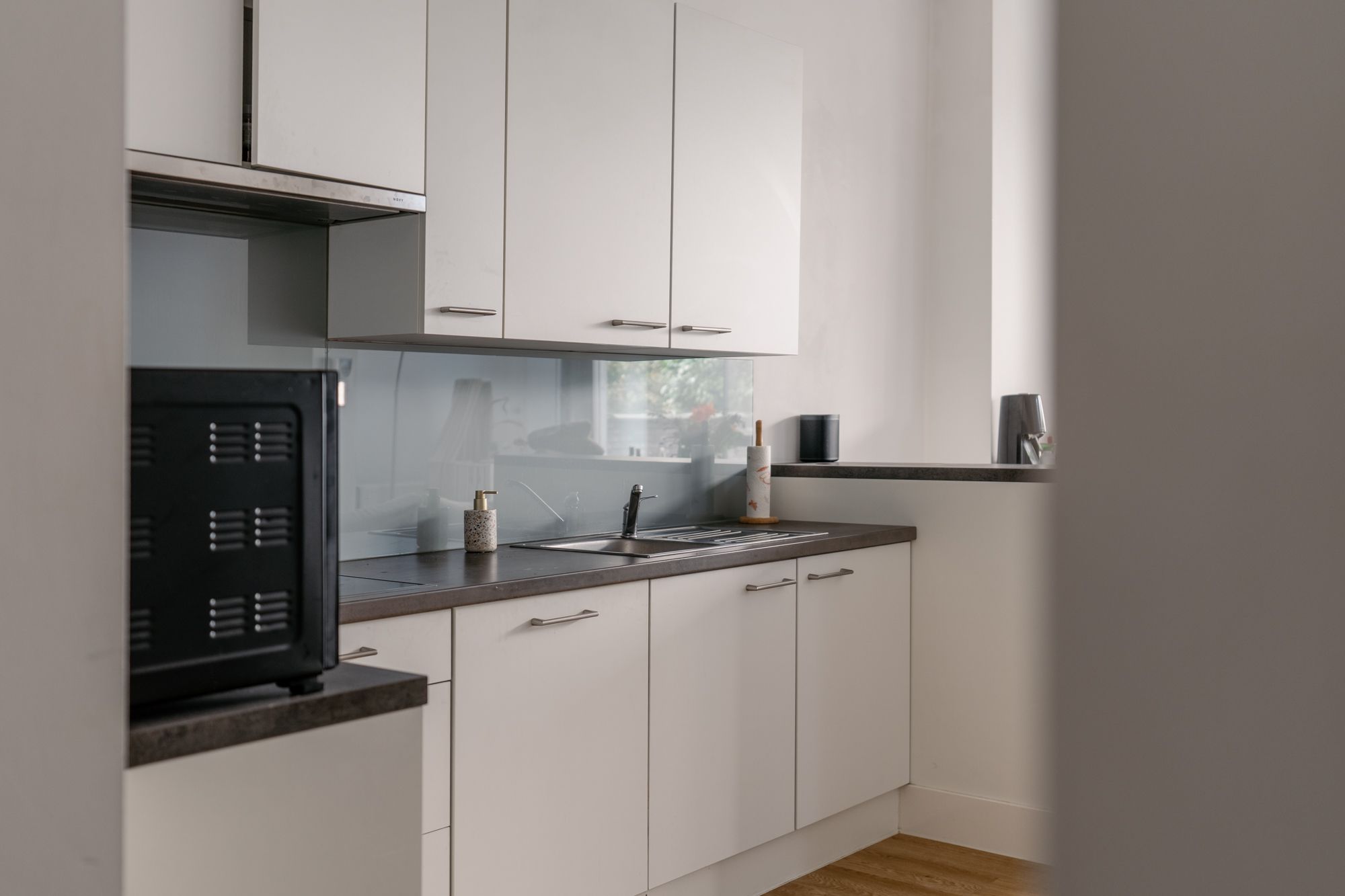 Gelijkvloers appartement met zuid georiënteerde tuin aan het oude Gerechtshof foto 5